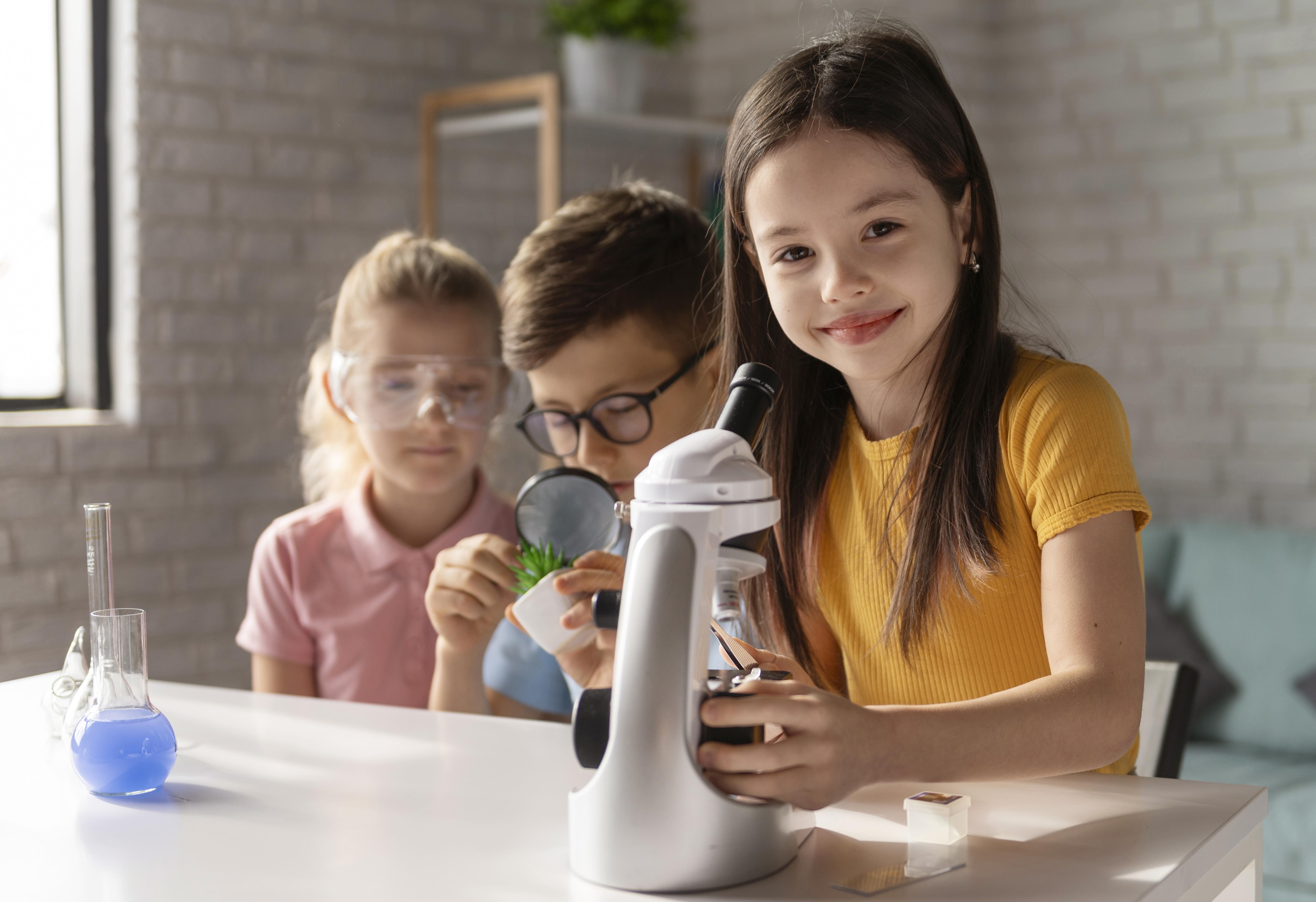 Young explorers building with STEM kits